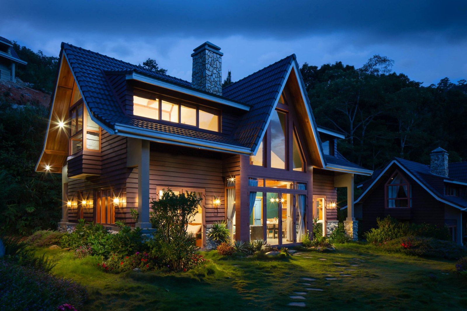 Beautiful home illuminated at dusk